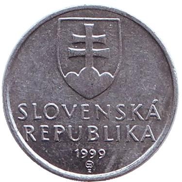 Монета 10 геллеров. 1999 год, Словакия. Деревянная колокольня.