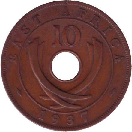 Монета 10 центов. 1937 год, Восточная Африка.(Отметка монетного двора: "KN"). Монета 10 центов. 1937 год, Восточная Африка.(Отметка монетного двора: "KN").