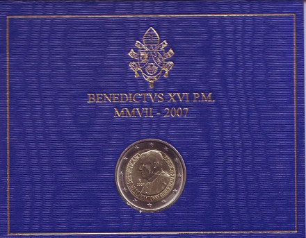 Монета 2 евро. 2007 год, Ватикан. (в буклете) 80 лет со дня рождения Папы Римского Бенедикта XVI.