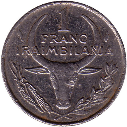 Монета 1 франк. 1981 год, Мадагаскар. Буйвол. Пуансеттия.