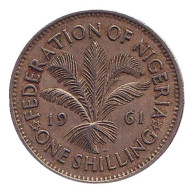 Монета 1 шиллинг. 1961 год, Британская Нигерия. Монета 1 шиллинг. 1961 год, Британская Нигерия.