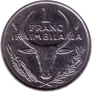 Монета 1 франк. 1983 год, Мадагаскар. Буйвол. Пуансеттия. Монета 1 франк. 1983 год, Мадагаскар. Буйвол. Пуансеттия.