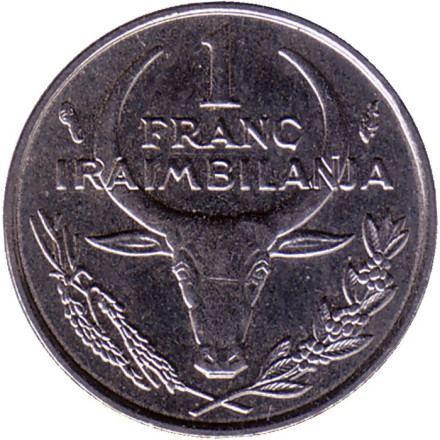 Монета 1 франк. 1983 год, Мадагаскар. Буйвол. Пуансеттия.