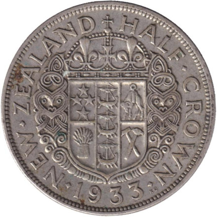 Монета 1/2 кроны. 1933 год, Новая Зеландия. Георг V.