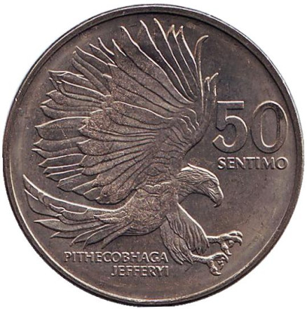 Монета 50 сентимо. 1983 год, Филиппины. aUNC. (Ошибка в названии орла - "PITHECOBHAGA") Филиппинский орел.