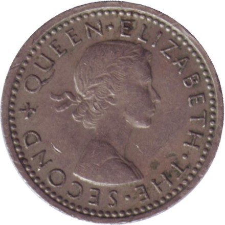 Монета 3 пенса. 1959 год, Новая Зеландия. Скрещенные вахаики.