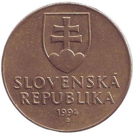 Монета 10 крон. 1994 год, Словакия. Бронзовый крест с выгравированными рисунками и орнаментом (Х – ХI вв.).