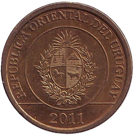 Монета 1 песо. 2011 год, Уругвай. Из обращения. Броненосец. Монета 1 песо. 2011 год, Уругвай. Из обращения. Броненосец.